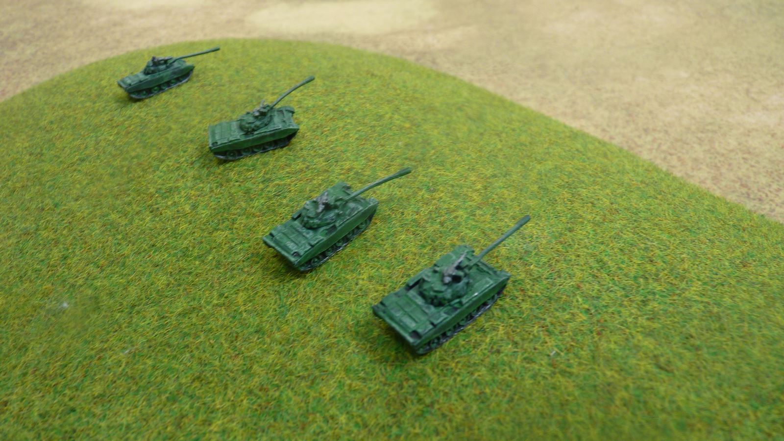 Soviet tanks take up position on a hill